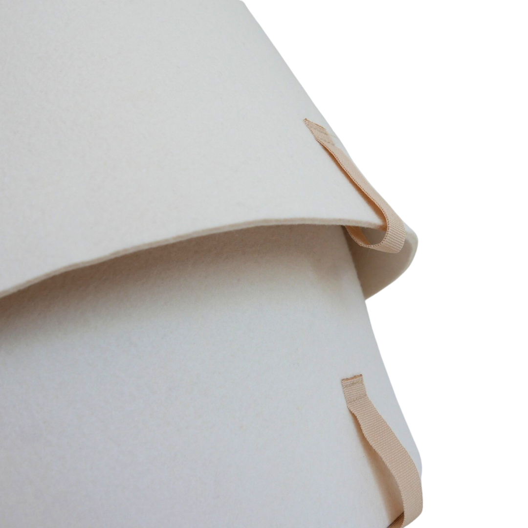 Close-up of the seamless edge construction on a FELT. The Classic merino wool sauna hat